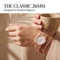 Montre de luxe pour femme en or rose, cadran pavé de cristaux, montre-bracelet tendance en acier inoxydable pour femme, montre habillée à quartz avec lunette cannelée