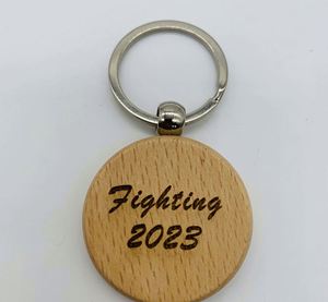 Promotion de gros usine : Porte-clés rond en bois créatif pour gravure, petit cadeau en bois - Product Image 1