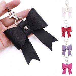Stocked 6 Colors Durable Elegant Cute Bow Charm Hanging PU Leather Bag Purse <b>Key</b> Chains Accessory Gift for Girls Women Birthday - Product Image 1