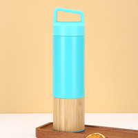Bouteille d'eau isotherme en acier inoxydable à double paroi de 550 ml avec couvercle et poignée, en bambou écologique, personnalisable avec logo OEM, idéale pour le bureau et les voyages, vente en gros
