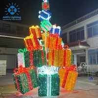 Boîte-cadeau en tinsel coloré empilable Anpu avec motif lumineux LED pour la décoration de la place de Noël