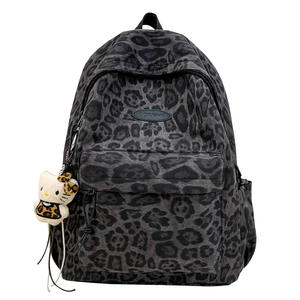 Nueva <span class=keywords><strong>mochila</strong></span> con estampado de leopardo, bolso versátil y elegante para estudiantes de secundaria, <span class=keywords><strong>mochila</strong></span> de alta gama para mujer. - Product Image 1