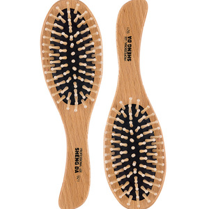 Cepillo de pelo ovalado de madera Sheng Da 921 con cojín de masaje para el cuidado y peinado del cabello - Product Image 2