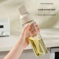 Distributeur d'huile en verre à bascule automatique anti-goutte, design tendance et pratique, pour la cuisine domestique et le stockage