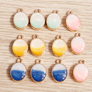 10 piezas por paquete: Nuevo colgante <span class=keywords><strong>de</strong></span> joyería <span class=keywords><strong>de</strong></span> <span class=keywords><strong>jade</strong></span> ovalado con efecto <span class=keywords><strong>de</strong></span> goteo <span class=keywords><strong>de</strong></span> aceite en aleación. - Product Image 1