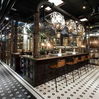 Comptoir de bar commercial éclairé en marbre au design moderne personnalisé pour restaurant, bar à vin et bar à jus