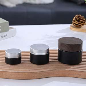 Tarros cilíndricos de vidrio borosilicato ámbar negro mate esmerilado con tapa de rosca de bambú para crema cosmética de ojos de 10g, 20g, 50g - Product Image 1