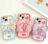 Coque de téléphone portable en silicone véritable antichoc avec support pliable en forme de papillon 3D, design personnalisé, vente en gros, iPhone 16 15 Pro Max 14 13