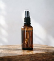 Flacon en verre ambré rond de 50 ml avec couvercle opaque, récipient scellé pour l'emballage d'huiles essentielles, de sérums et de produits de soin de la peau