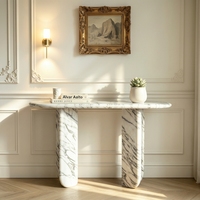 Table console contemporaine en marbre Bianco Carrara à pieds courbes, idéale pour les appartements modernes et minimalistes et les halls élégants