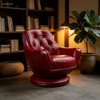 Fauteuil club pivotant de style mid-century moderne en cuir bordeaux capitonné avec base sur piétement pour salon ou bureau