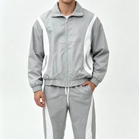 Ensemble de survêtement de luxe pour homme en nylon, coupe oversize personnalisée, coupe-vent avec col rabattable et pantalon de jogging, 2 pièces