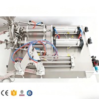 Machine semi-automatique pneumatique pour liquides (jus, lait, huile, pâtes) en bouteilles en verre, sacs, pochettes, barils - Industrie des boissons et des produits de consommation