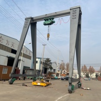 Grúa Pórtico sobre Ruedas de Alta Eficiencia (RTG) de 30/40 Toneladas con Dirección 360°, Motor y Engranajes, Control Remoto para Contenedores en Puertos y Almacenes