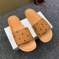 Pantoufles de luxe unisexes de haute qualité, pantoufles de créateur en cuir véritable, pantoufles tendance pour femmes