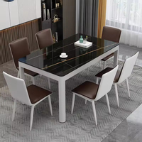 Ensemble de salle à manger moderne et minimaliste noir, pieds en fer, plateau en pierre frittée, écologique, durable, 6 places, pour salon