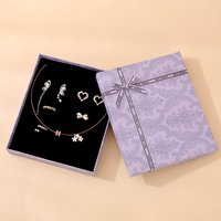 Boîte cadeau pour bijoux avec couvercle et base, doublure en éponge douce de couleur lavande pour ranger les bagues, les colliers et les accessoires, vente en gros