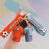 Ventes en gros de maillots de football, porte-clés cadeaux, jouets de football, acceptation de logo personnalisé, cadeau de fête, jouet capsule pour enfants et adultes