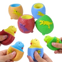 Nouveauté OEM Jouets à presser Dinosaure mignon qui sort de la tasse Jouets en peluche anti-stress pour enfants et adolescents 14+