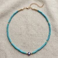 Collier de perles turquoise style bohème pour femme, avec accent doré et pierres vintage, accessoire quotidien pour dames