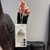 Étui de téléphone de luxe élégant avec strass scintillants et miroir en forme de cœur pour Samsung Galaxy S26 Ultra S25 A55, avec dragonne en cristal