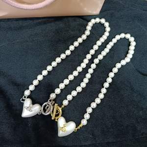 Western Queen Mother Vivienne New Big Love Faux Pearl Rhodium Plated White Strand Necklace Women European American Personality - Product Image 1