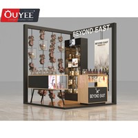 Conception et fabrication de kiosque à parfum romantique personnalisé, flacon de parfum en verre, kiosque mural de centre commercial, kiosque à parfum, présentoir de kiosque
