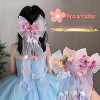 Cadeau d'anniversaire tendance : Pinces à cheveux artisanales à motif dessin animé, maintien doux, longs rubans, fleurs de rêve, nœuds pour petites filles, style princesse
