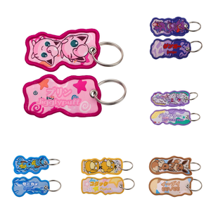 2026 Hot New POKE Monster Custom Wholesale Woven Fabric Double Side Motorcycle Anime logo Cartoon Jet Tags Embroidery Keychain - Product Image 1