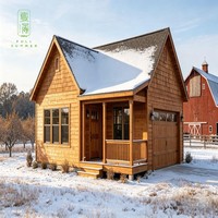 Maison en bois préfabriquée avec garage intégré pour une vie de vacances