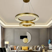 Lustre en cristal élégant et luxueux, lampe suspendue ronde postmoderne pour chambre à coucher, restaurant et salle d'exposition de villa