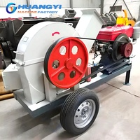 Broyeur à disques haute efficacité pour le traitement des bûches de 15 à 45 cm avec alimentation par convoyeur pour la fabrication de pâte à papier et de planches de bois