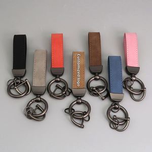 Porte-clés de voiture en cuir PU neuf en gros, porte-clés anti-perte en alliage de zinc, porte-clés en cuir avec logo gaufré - Product Image 1
