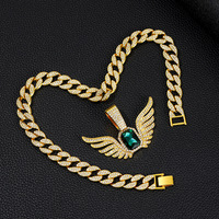 Collier pendentif ailes d'ange dorées luxueuses avec pierre verte et chaîne cubaine en strass pour la mode hip-hop et les cadeaux