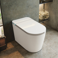 WC intelligent monobloc en céramique blanche avec capteur de lumière à chasse automatique, siège chauffant et télécommande