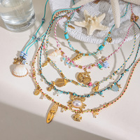 Collier en acier inoxydable plaqué or 18 carats, anti-ternissement, avec breloques coquille de crabe, étoile de mer, poisson, hippocampe, bijoux d'été style Mermaidcore