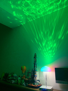 Lampe d'Ambiance LED Méduse Premium avec Projecteur d'Ondulations Aquatiques, Haut-Parleur Bluetooth et Musique Apaisante à <span class=keywords><strong>Bruit</strong></span> Blanc <span class=keywords><strong>pour</strong></span> un Sommeil Amélioré - Product Image 1