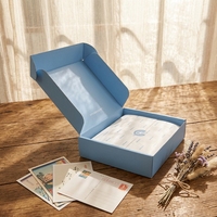 Boîtes en carton pliables de couleur personnalisée pour l'emballage de vêtements et les boîtes en papier à encre de soja utilisées pour le transport de marchandises