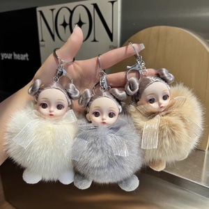 พวงกุญแจตุ๊กตาหมีขนฟูเทียมแบบใหม่ ประดับโบว์และพู่ห้อย สำหรับผู้หญิง - Product Image 1