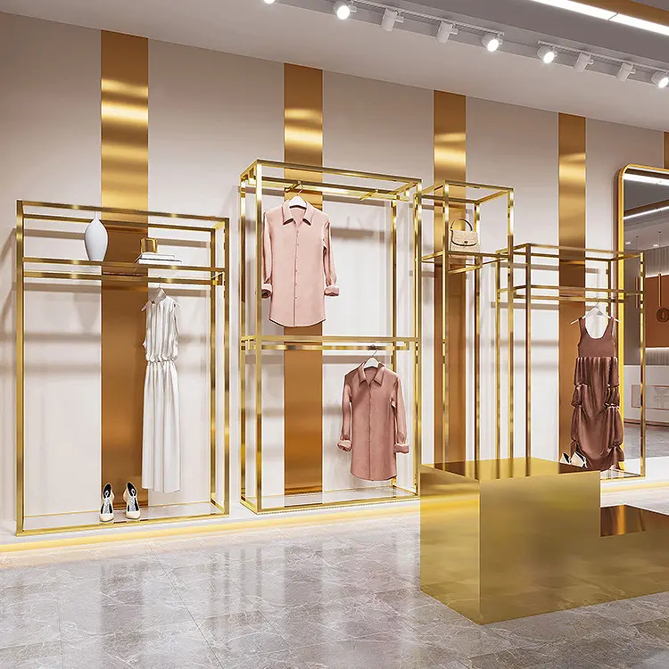Scaffali per abbigliamento in oro Boutique personalizzati in acciaio inossidabile scaffale in metallo per abbigliamento espositore per abiti da negozio per negozi di abbigliamento