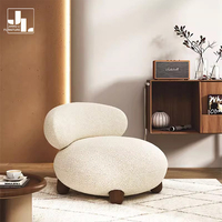 Chaise de canapé simple de salon nordique tissu en peluche blanc chaise de loisirs d'accent d'hôtel de luxe moderne avec pouf