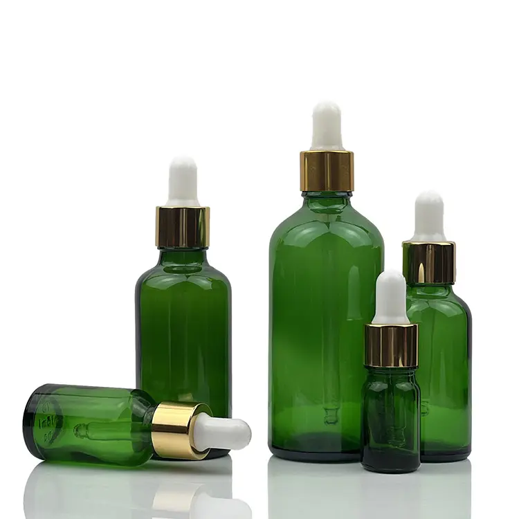 Flacone contagocce di olio essenziale di vetro verde con coperchio corona oro e argento da 5ml a 100ml per cosmetici