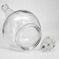 Bouteille de brandy en verre cristallin de 700 ml en gros d'usine avec bouchon en plastique, bouteille de liqueur, whisky, vodka, spiritueux personnalisée
