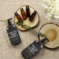Huile de massage au gingembre réchauffante anti-cellulite de marque privée pour le drainage lymphatique
