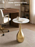 Table basse moderne en dalle de roche dorée avec piétement sculptural en fer, portable pour salon et hôtel, OEM ODM