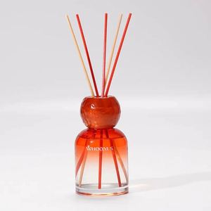 WHOOM 5 Ensemble de diffuseurs à roseaux en verre rond faits à la main avec bouteille dégradée orange - Product Image 1