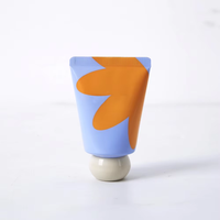 Tube cosmétique souple 30mm 30ml 50ml avec capuchon à bille rond, design mignon, imprimé personnalisé, tube de crème pour les mains abstrait, avec logo personnalisé