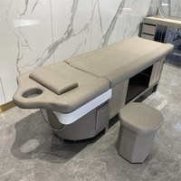 Fauteuil de lavage capillaire professionnel à vapeur, lit de shampoing moderne pour spa avec thérapie aquatique et massage thaïlandais, et armoire de rangement