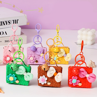 Nouveauté 2026 : Mini porte-monnaie en cuir PU tressé bohème avec porte-clés |   Charme de sac mignon avec nœud et fleur |   Cadeau de vacances et faveur de mariage