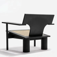 Fauteuil d'appoint moderne en bois massif noir personnalisable, assise en rotin tressé à la main, accoudoirs géométriques, pour salon, hôtel, loisirs